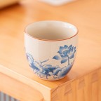 White porcelain six-cup teapot set with iron handle (lotus pattern)